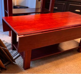 Wood coffee table w/two drop leaves