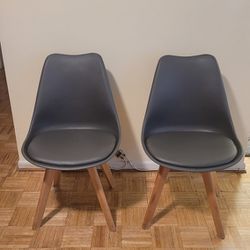 Two Gray Eames Style Mid-century Modern Chairs