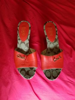 Authentic Coach slip ons