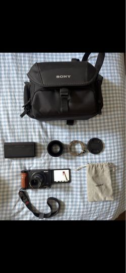Sony ZV-1 Vlogging Camera Bundle - SmallRig Grip, Neewer Lens, 4 Batteries & Bag