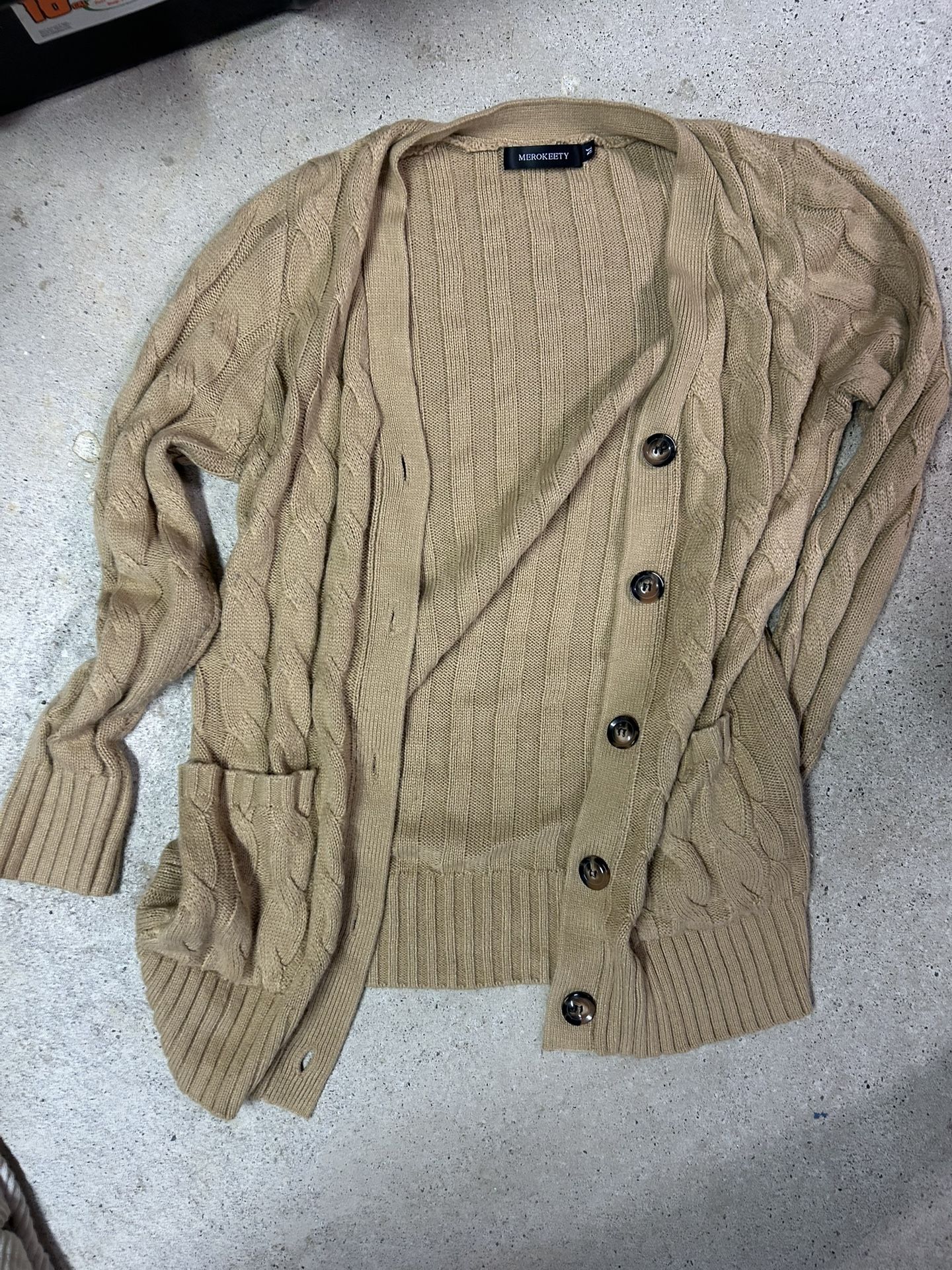 Tan cable knit cardigan with button up front and pockets size medium 