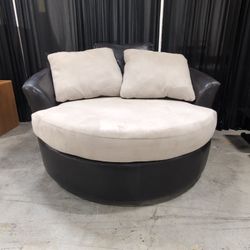 Ashley Furniture Black and Beige Round Swivel Chair
