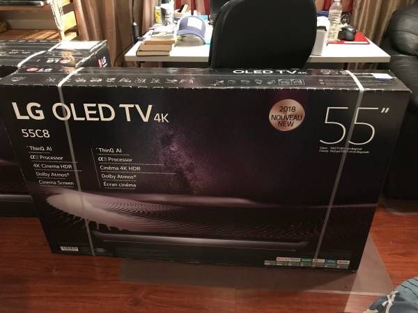 New In Box LG 55 inch OLED TV Model C8