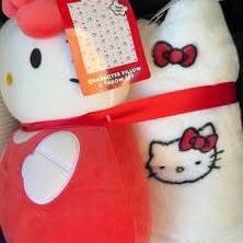 Hello kitty plush with blanket . Brand new . 2 available 30$ each or both for 55$