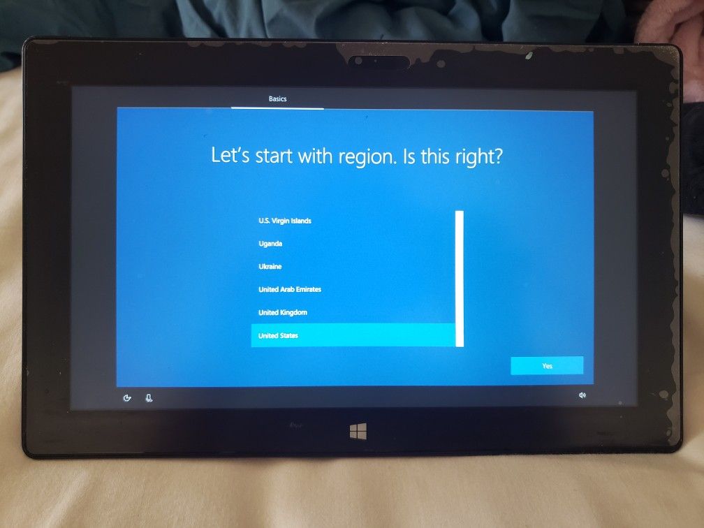 Surface pro 2 with charger, pen, type cover, and c as se