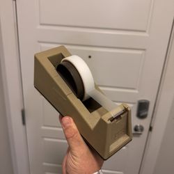 Tape Dispenser With Replacement Roll