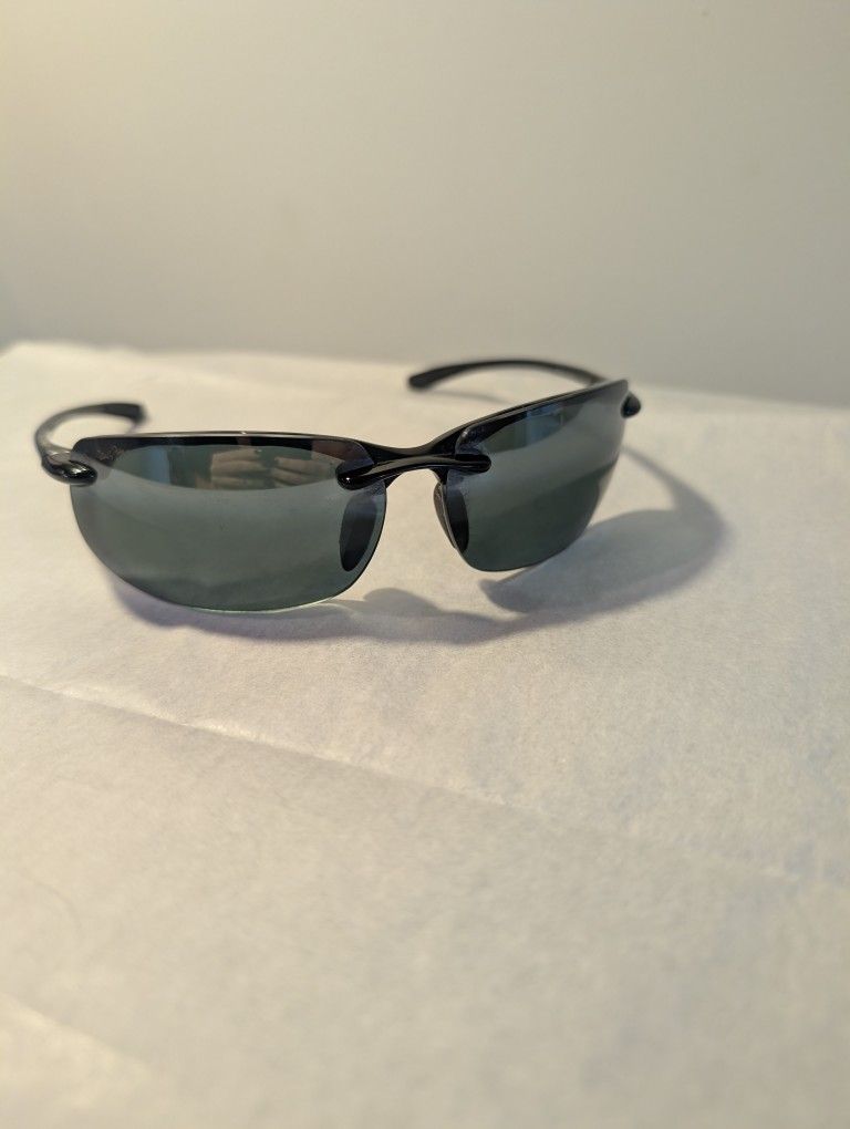 Maui Jim Banyans polarized rimless sunglasses with neutral grey lenses.