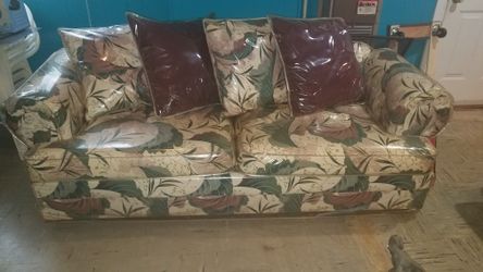 2 year old sofa and love seat kept in plastic