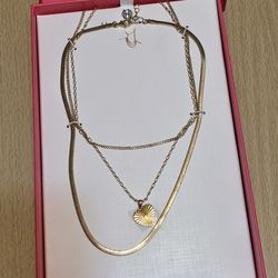 House of Harlow 1960 Set of 3 Necklaces with a heart pendant and gold-tone finish.  New with Box