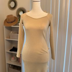 short cream dress with long sleeves.