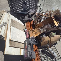 Free, must want all, yes, it's available, no holds. Tools, shelf, MDF squares, tire chains, hoover floor mate parts, wire spool, saw blades