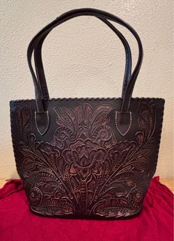 Bolsa de piel cincelada a mano u forrada en piel