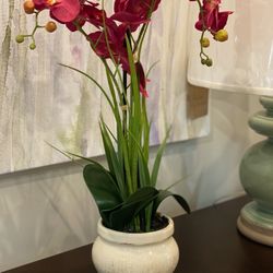 Spring orchids floral arrangement in pot flower. Overall: 24” H x 12” W x 7” D. Flower material: fabric. Pot color: beige. Base: ceramic. MSRP: $68. O
