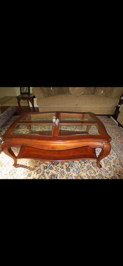 MOVING SALE Cost $950 Beautiful  Walnut Wood Coffee Table With Glass Shelves 
