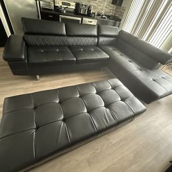 Black Sectional With Ottoman