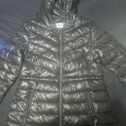 The DKNY Woman's Packable Mid Length Hooded Puffer Jacket