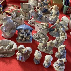 Blue tone figurines. $10 for the large ones and five dollars for the small ones