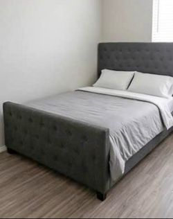 Grey Queen size bed in mint condition. No wear and tear
