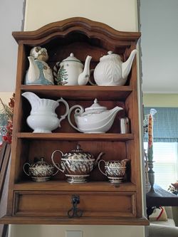 Shelf with teapots