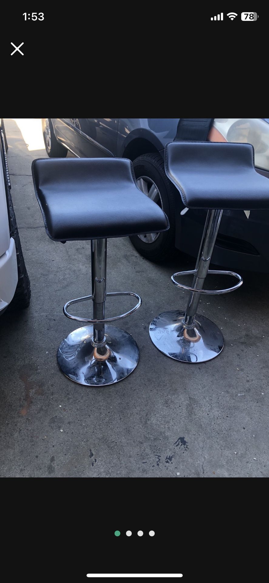 Black and silver stool you can lower or raise them they are in good conditio