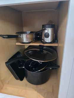 Pots pans plates and cups