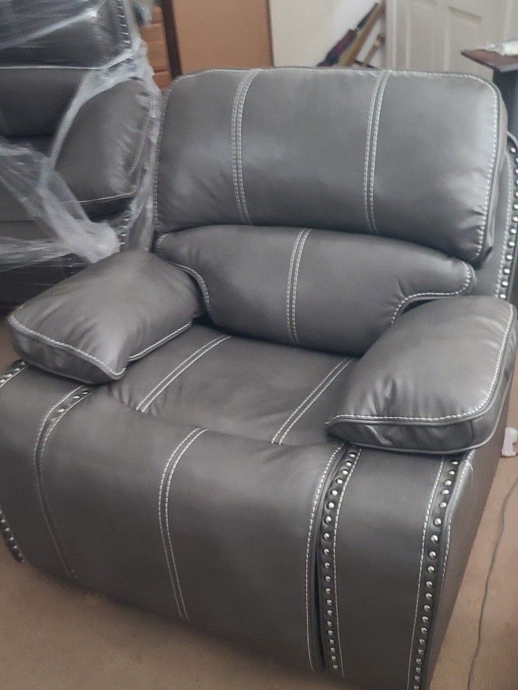 BRAND NEW RECLINING ROCKING CHAIRS