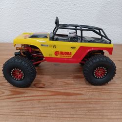 Axial Rock Crawler with Remote and Extra Wheels