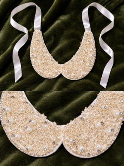 Pearl & Rhinestone Embellished Collar Necklace with Satin TiesBeautiful statement collar embellished with creamy faux pearls and sparkling rhinestones