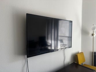 49” Toshiba Flat Screen TV + Roku Stick & Wall Mount