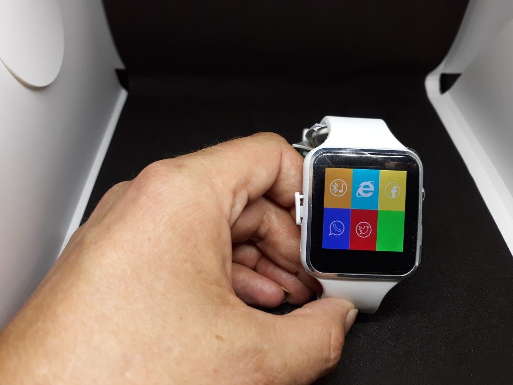 New white smartwatch with HD camera internet explorer facebook get calls and texts and much more
