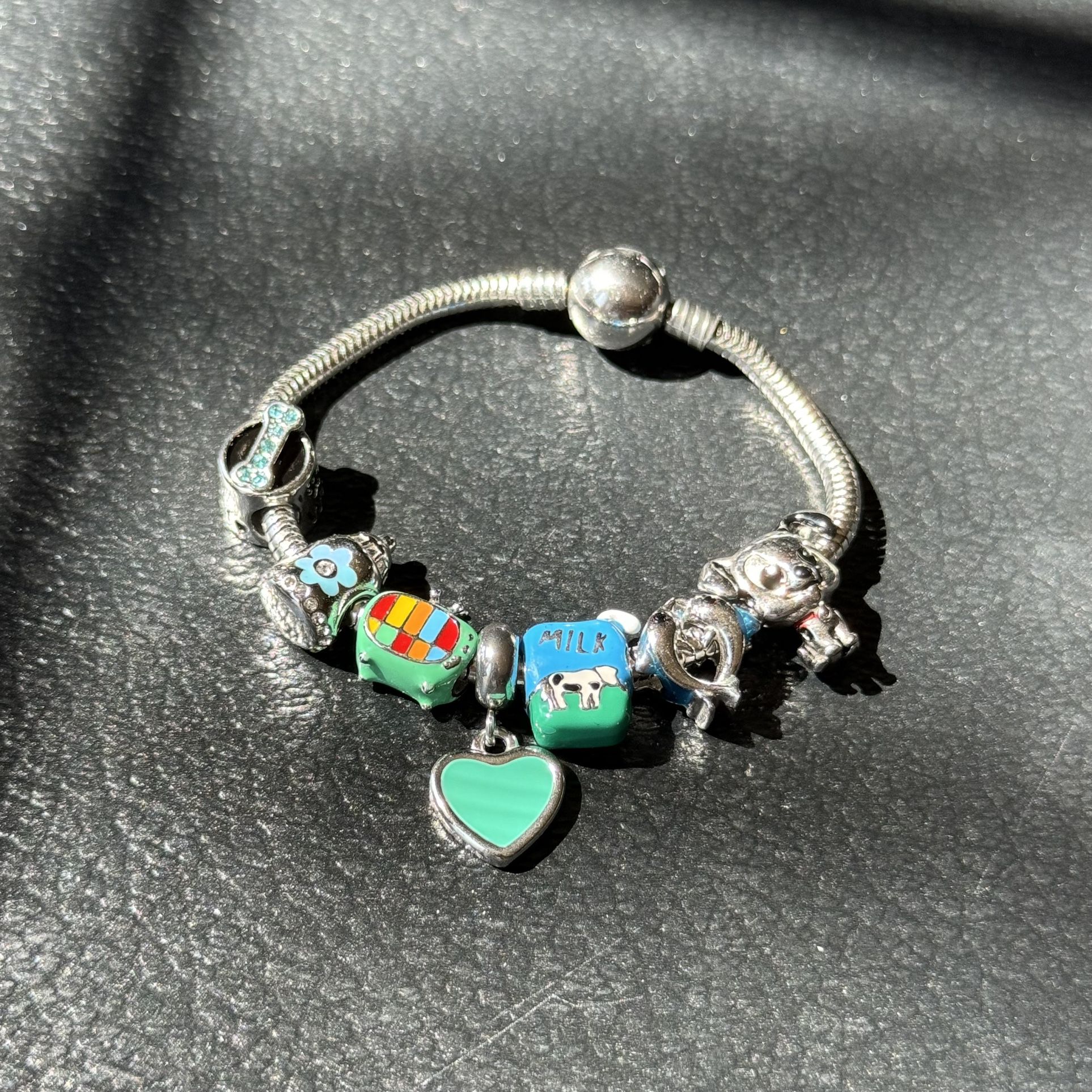girls teal bracelet with charm all of stainless steel 16 cm