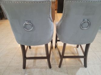 Pair of Gray Tufted Velvet Bar Stools with Ring Pulls