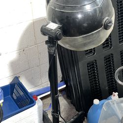 Hooded dryer with stand