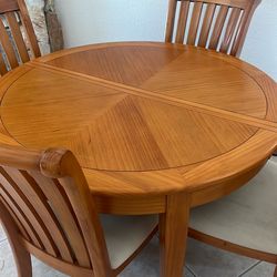 48” Table With Leaf And Four Chairs