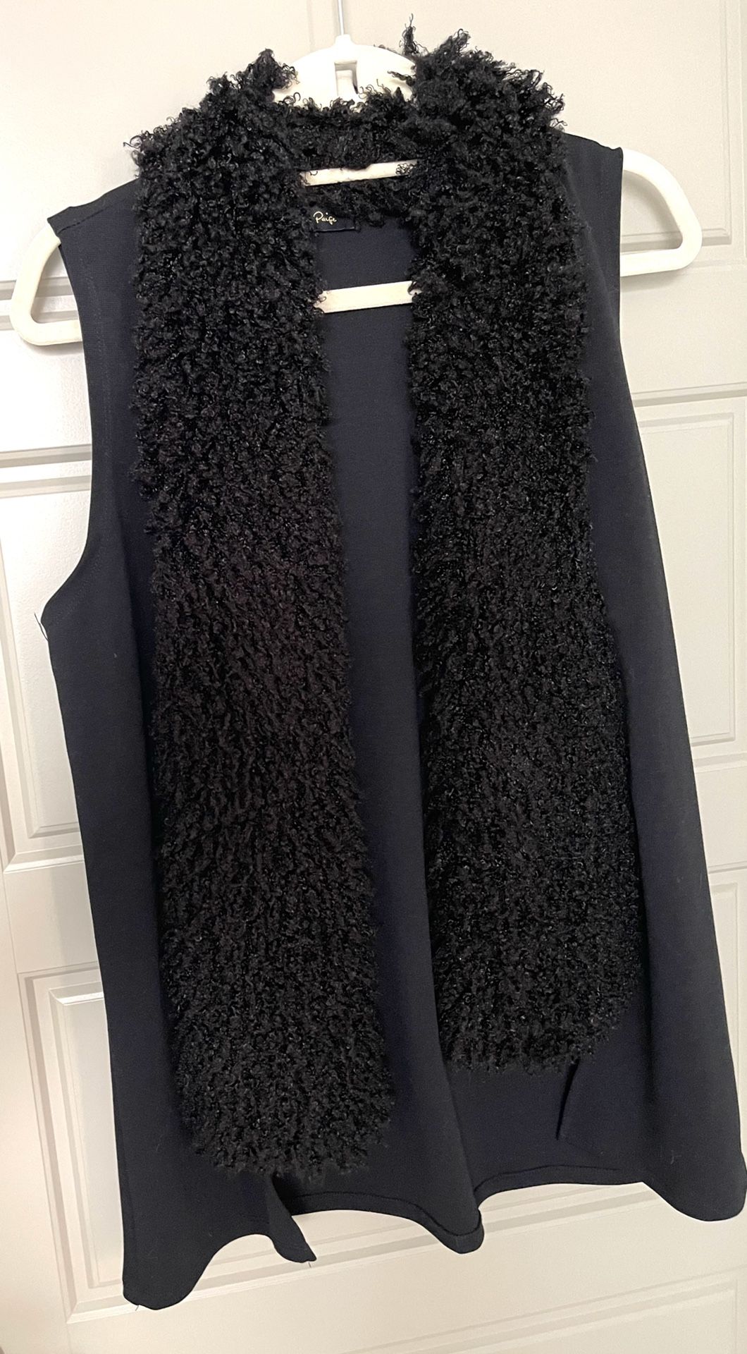 Never Worn - Melissa Paige- Black sleeveless open front cardigan sweater.  Fluffy around collar & down front.  L-XL