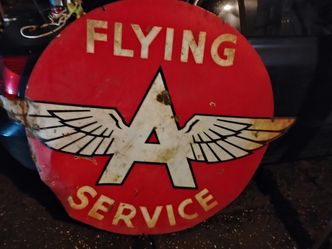 Antique gas station sign