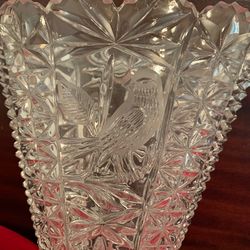 Clear fan vase possibly pressed glass has a bird etching