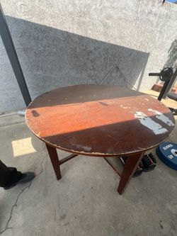 Round wood table (4 foot by 4 foot)