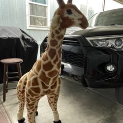 Melissa and Doug 4 Foot Stuffed Giraffe.
