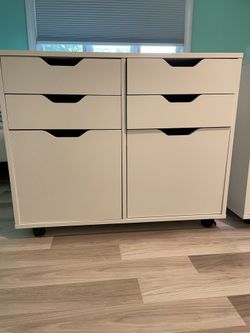 White storage with 4drawers +2 rolling door
