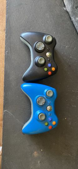 Two wireless Xbox controllers