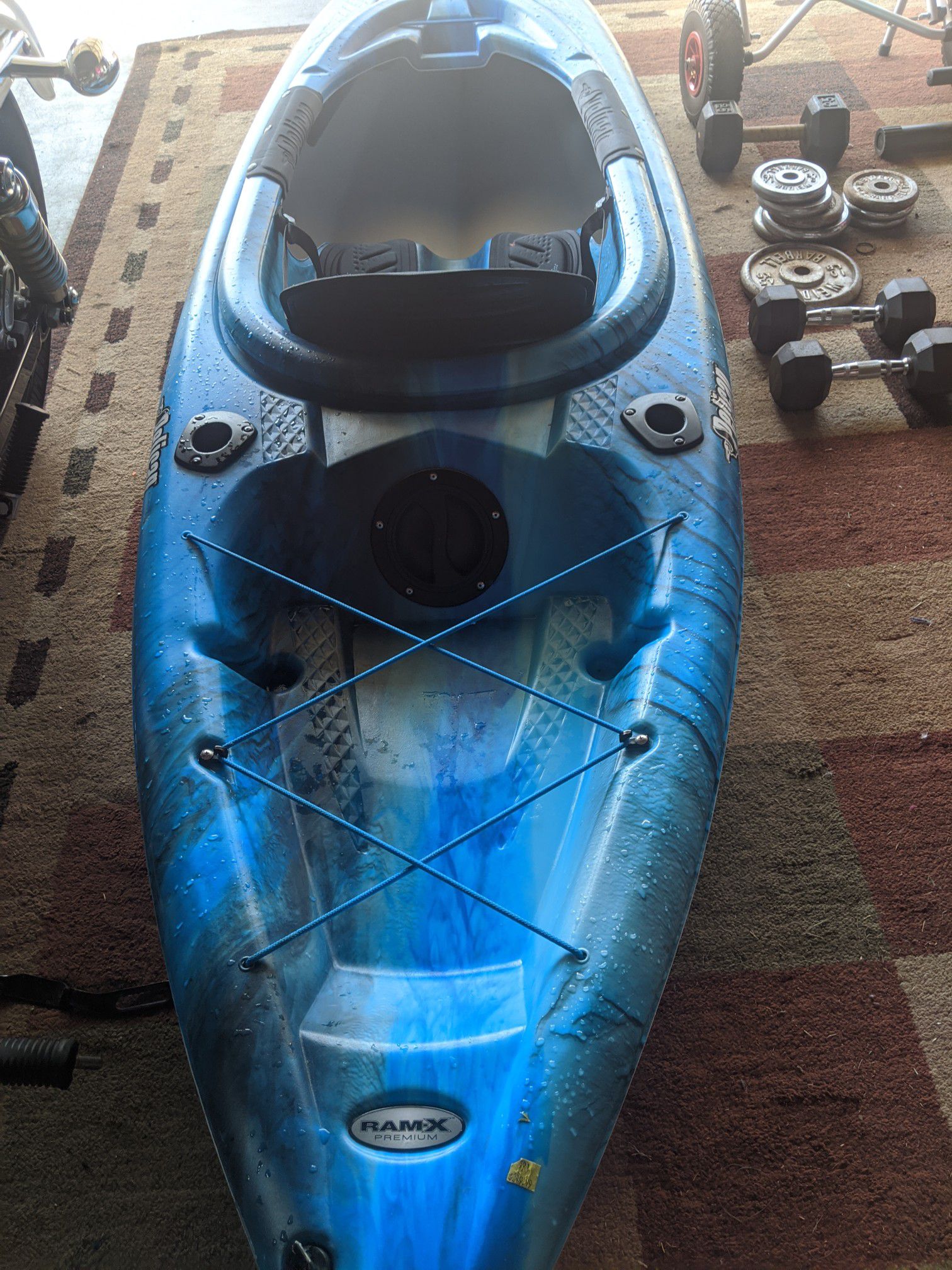 Hybrid kayak for cruising and fishing...great for lakes or ocean... about 1 year old with minor scuffs on the bottom..stored Indoors..pretty much. New