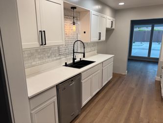 White shaker Kitchen cabinets  and countertops