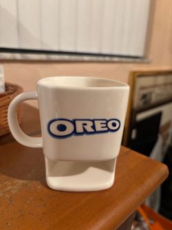 Oreo ceramic novelty mug with built in slot compartment