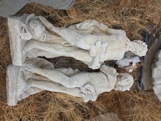 Concrete man and woman statues