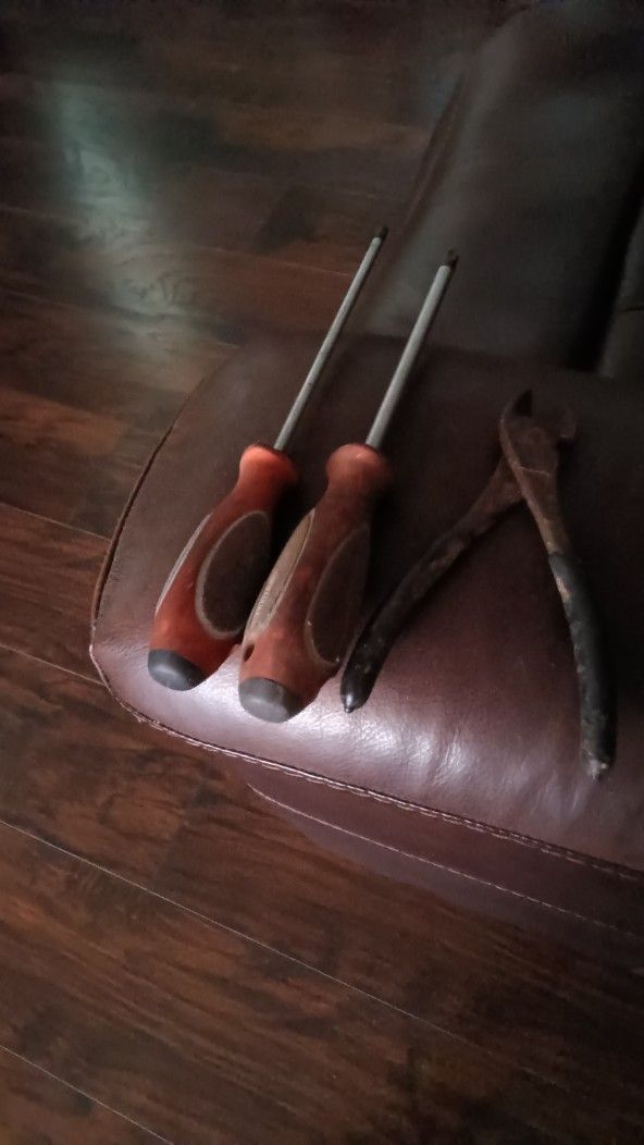 Two Screwdriver And Wrench