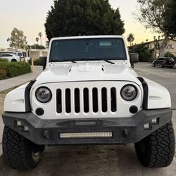 213 Jeep Wrangler Unlimited Sport  Oscar Mike