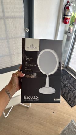 LED hand mirror with crystals