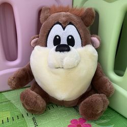 Brown doll plush toy