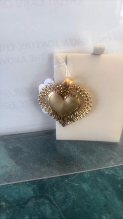 Rolex heart pendent